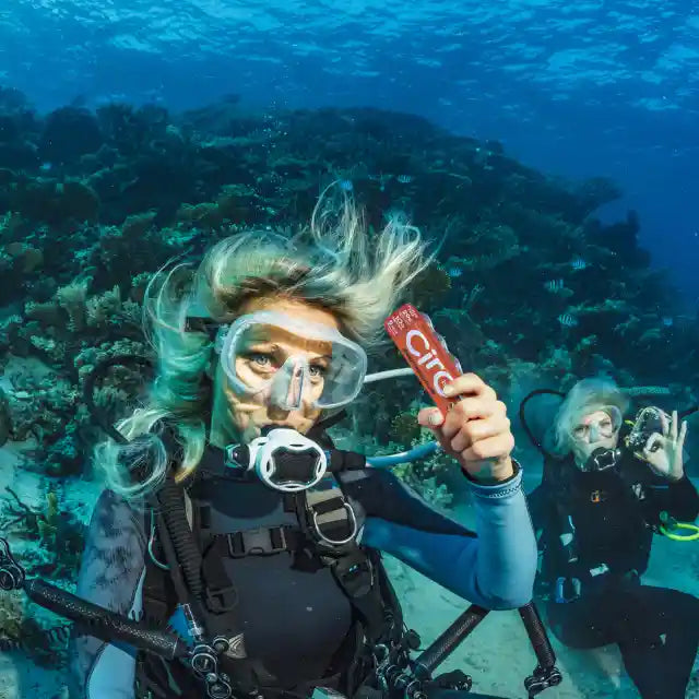 Scuba divers showcasing the energy and protein in CirC energy bites 